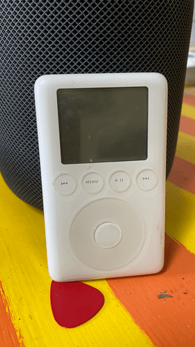 photo of the the 10G iPod leaning against a HomePod